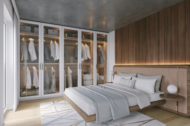 The principal bedroom, bed turned toward a sliding door that opens onto the deck.